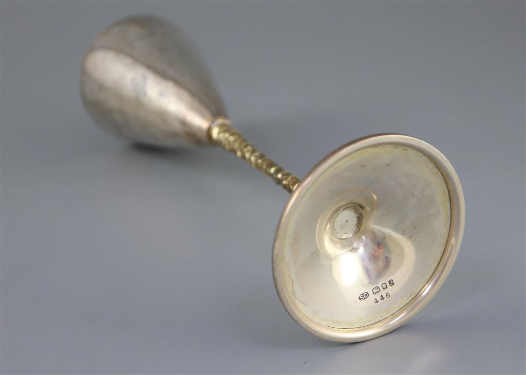 A set of six modern Stewart Devlin parcel gilt silver goblets (Senior Falcon Award 1979 & 1980) in two fitted cases (4 & 2),
